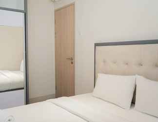 Bedroom 2 2BR Apartment at Elpis Residence near Ancol By Travelio