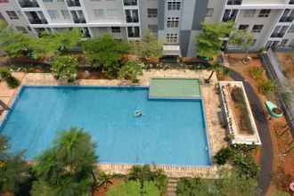 Swimming Pool 4 Studio Simply Furnished Apartment at Scientia Residance By Travelio