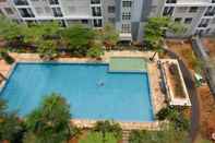 Swimming Pool Studio Simply Furnished Apartment at Scientia Residance By Travelio