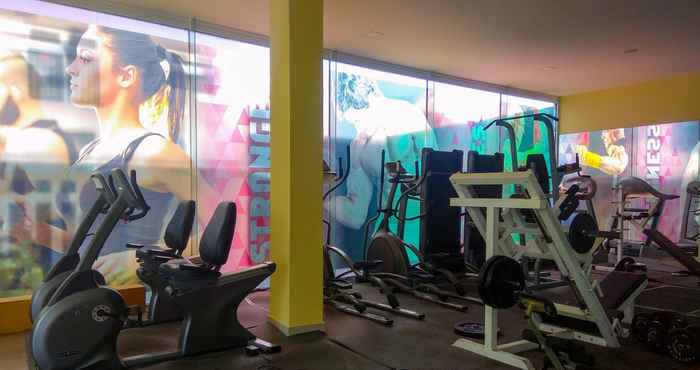 Fitness Center 2BR Fully Furnished at Teluk Intan Apartment By Travelio