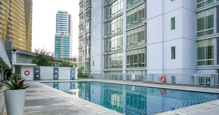 Lobi 2BR Modern and Comfortable at The Empyreal Condominium Epicentrum Apartment By Travelio