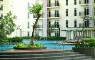 Swimming Pool 3 Studio City View Apartment at Puri Orchard By Travelio