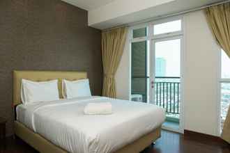 Bedroom 4 Studio City View Apartment at Puri Orchard By Travelio