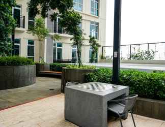 Lobby 2 Studio City View Apartment at Puri Orchard By Travelio