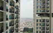 Exterior 5 Studio Pool View Apartment at Puri Orchard By Travelio