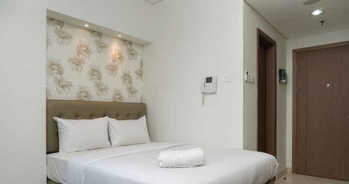 Bedroom Studio Pool View Apartment at Puri Orchard By Travelio