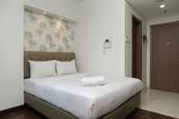 Bedroom Studio Pool View Apartment at Puri Orchard By Travelio