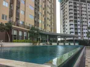 Lobby 1BR Best Price at Apartment The Oasis By Travelio