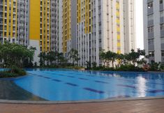 สระว่ายน้ำ 6 Modern 3BR Apartment at Springlake Summarecon Bekasi By Travelio