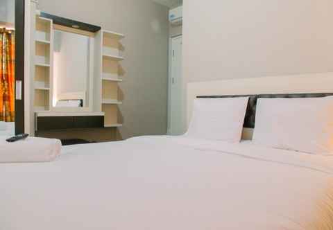 Bedroom Modern 3BR Apartment at Springlake Summarecon Bekasi By Travelio