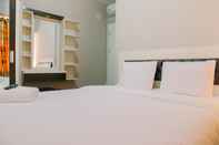 Bedroom Modern 3BR Apartment at Springlake Summarecon Bekasi By Travelio