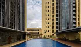 Swimming Pool 2 2BR Brand New The Branz Apartment By Travelio