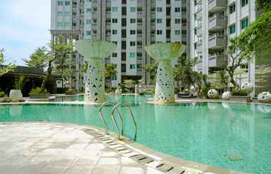 Swimming Pool 2 1BR Comfortable At Sky Terrace Apartment in Strategic Area By Travelio