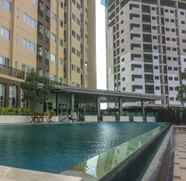 Swimming Pool 3 Studio Exclusive at The Oasis Cikarang Apartment By Travelio