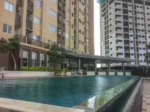 Swimming Pool 4 Studio Exclusive at The Oasis Cikarang Apartment By Travelio