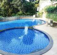 Swimming Pool 5 1BR Comfortable Near ITB University at Dago Suites Apartment By Travelio