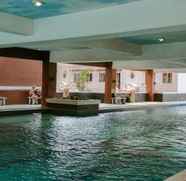 Swimming Pool 4 City Resort 2BR Apartment near Airport Soetta By Travelio