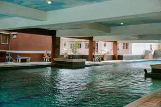 Swimming Pool 4 City Resort 2BR Apartment near Airport Soetta By Travelio