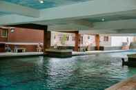 Swimming Pool City Resort 2BR Apartment near Airport Soetta By Travelio