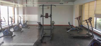 Fitness Center 3 Studio Minimalist and Comfortable Dave Apartment By Travelio