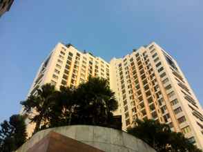 Bangunan 2BR Homey at Cervino Village Apartment By Travelio