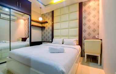 Lobi 2 2BR Homey at Cervino Village Apartment By Travelio