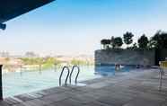 Swimming Pool 4 Studio Modern Apartment at Tamansari Papilio By Travelio