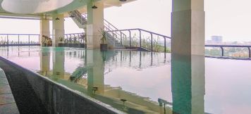 Swimming Pool 6 Apartment Atlanta Residances 1BR next to RS Bunda Margonda By Travelio