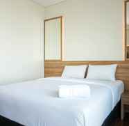 Kamar Tidur 5 Studio Modern and Fully Furnished at Puri Orchard Apartment By Travelio