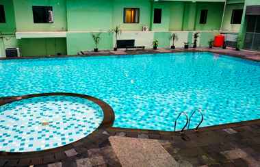 Swimming Pool 2 Studio Chic and Cozy Apartment at Menteng Square By Travelio