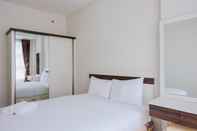Kamar Tidur Cozy 1BR Stay at Saveria Apartment By Travelio