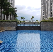 Swimming Pool 2 Cozy 1BR Stay at Saveria Apartment By Travelio