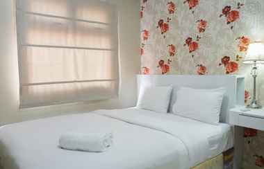 Bedroom 2 2BR Cozy for 3 Pax Green Pramuka Apartment By Travelio