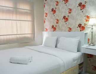 Bedroom 2 2BR Cozy for 3 Pax Green Pramuka Apartment By Travelio