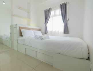 Bedroom 2 2BR with Mall Access at Green Pramuka Apartment By Travelio