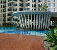 Lobi 2 Minimalist and Relaxing 1BR at Puri Orchard By Travelio