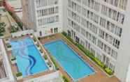 Swimming Pool 4 Cozy Studio at Taman Melati Margonda By Travelio