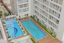 Swimming Pool Cozy Studio at Taman Melati Margonda By Travelio