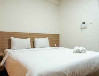 Bedroom 2 Minimalist and Comfy Studio @ Puri Orchard Apartment By Travelio