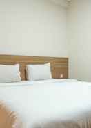 BEDROOM Minimalist and Comfy Studio @ Puri Orchard Apartment By Travelio