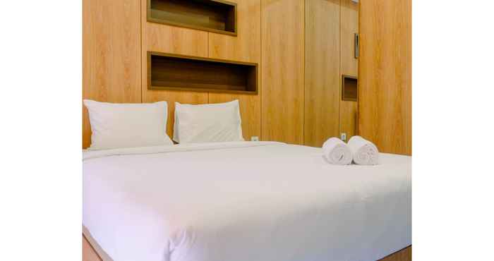 Bedroom Warm Studio Apartment at Casa De Parco By Travelio