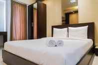 Lobi Studio Room Minimalist Style at UC Apartment Surabaya By Travelio