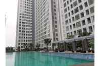 Swimming Pool 2BR Best Apartment @ Midtown Residence By Travelio