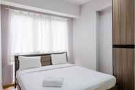 Bedroom 1BR at Serpong Midtown Signature Apartment By Travelio