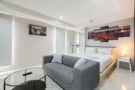 Lobby Studio Elegant and Comfy Azalea Suites Apartment Cikarang By Travelio