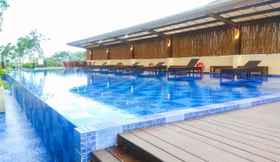 Swimming Pool 3 Studio Elegant and Comfy Azalea Suites Apartment Cikarang By Travelio