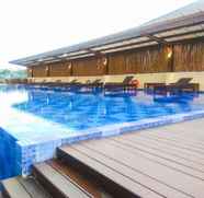 Swimming Pool 3 Studio Elegant and Comfy Azalea Suites Apartment Cikarang By Travelio
