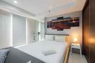 Kamar Tidur Studio Elegant and Comfy Azalea Suites Apartment Cikarang By Travelio