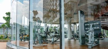Fitness Center 4 1BR Comfy and Best View Puri Mansion Apartment By Travelio