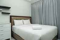 Kamar Tidur 1BR Comfy and Best View Puri Mansion Apartment By Travelio